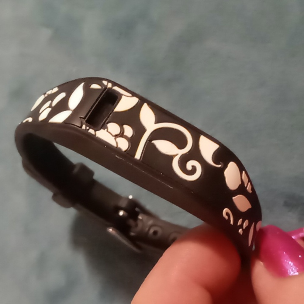 Fitbit flex with French bull floral wrist band. Fitness tracker